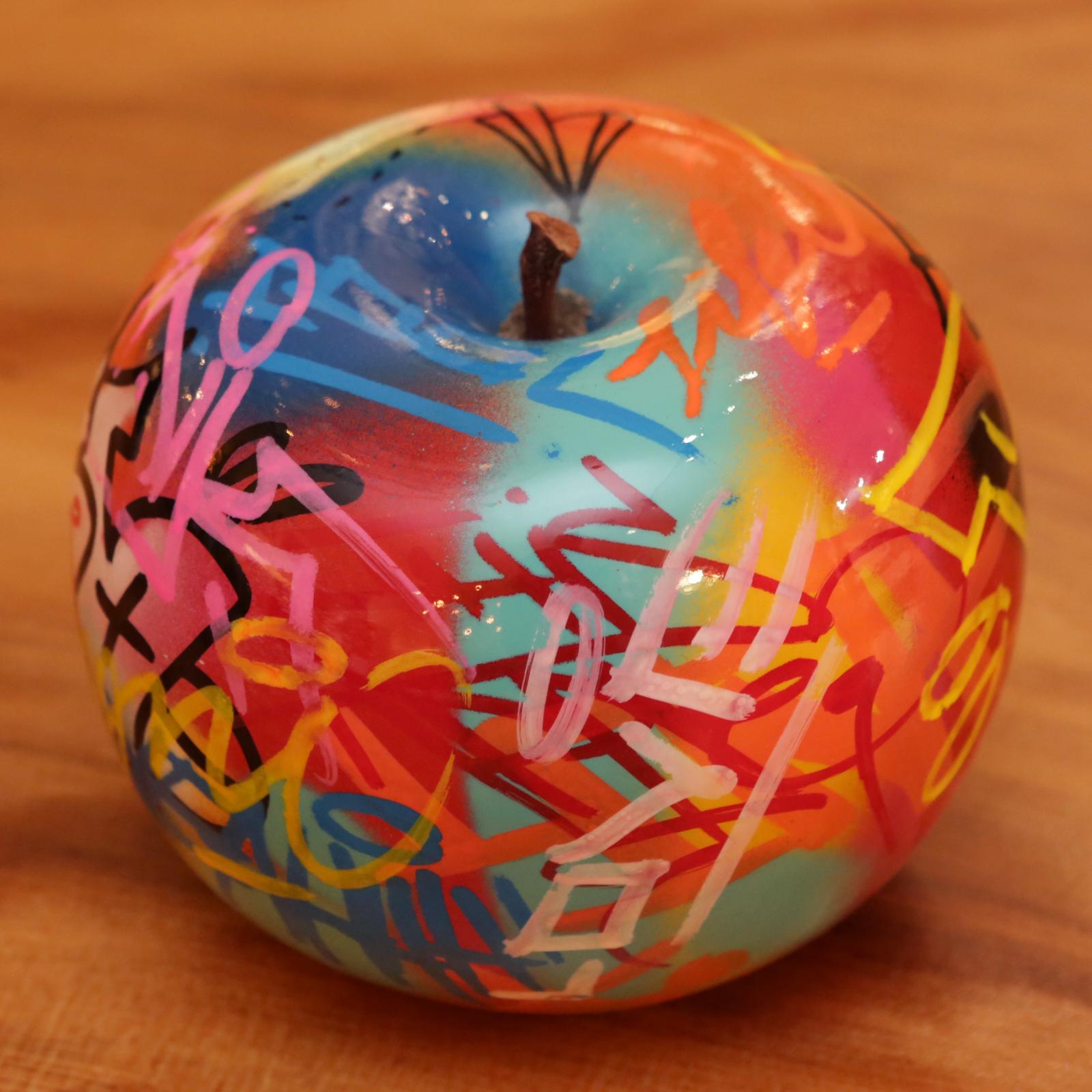 graffiti apple sculpture