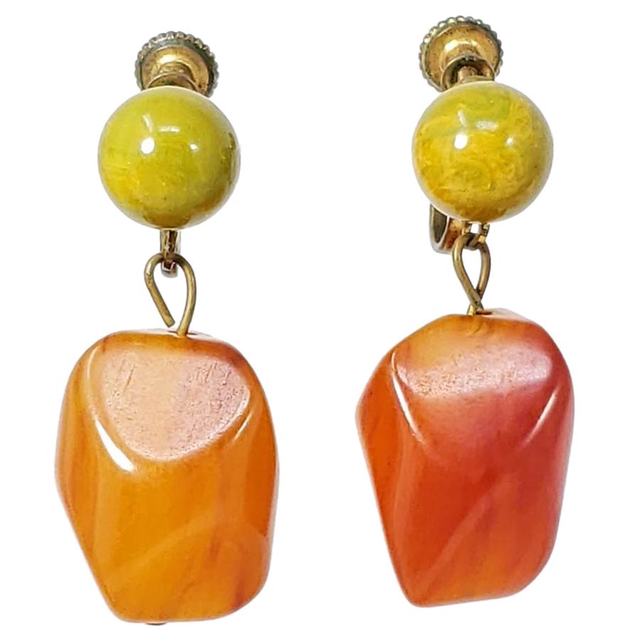 Apple Green and Amber Orange Bakelite Earrings, Vintage Brasstone Screw Back For Sale