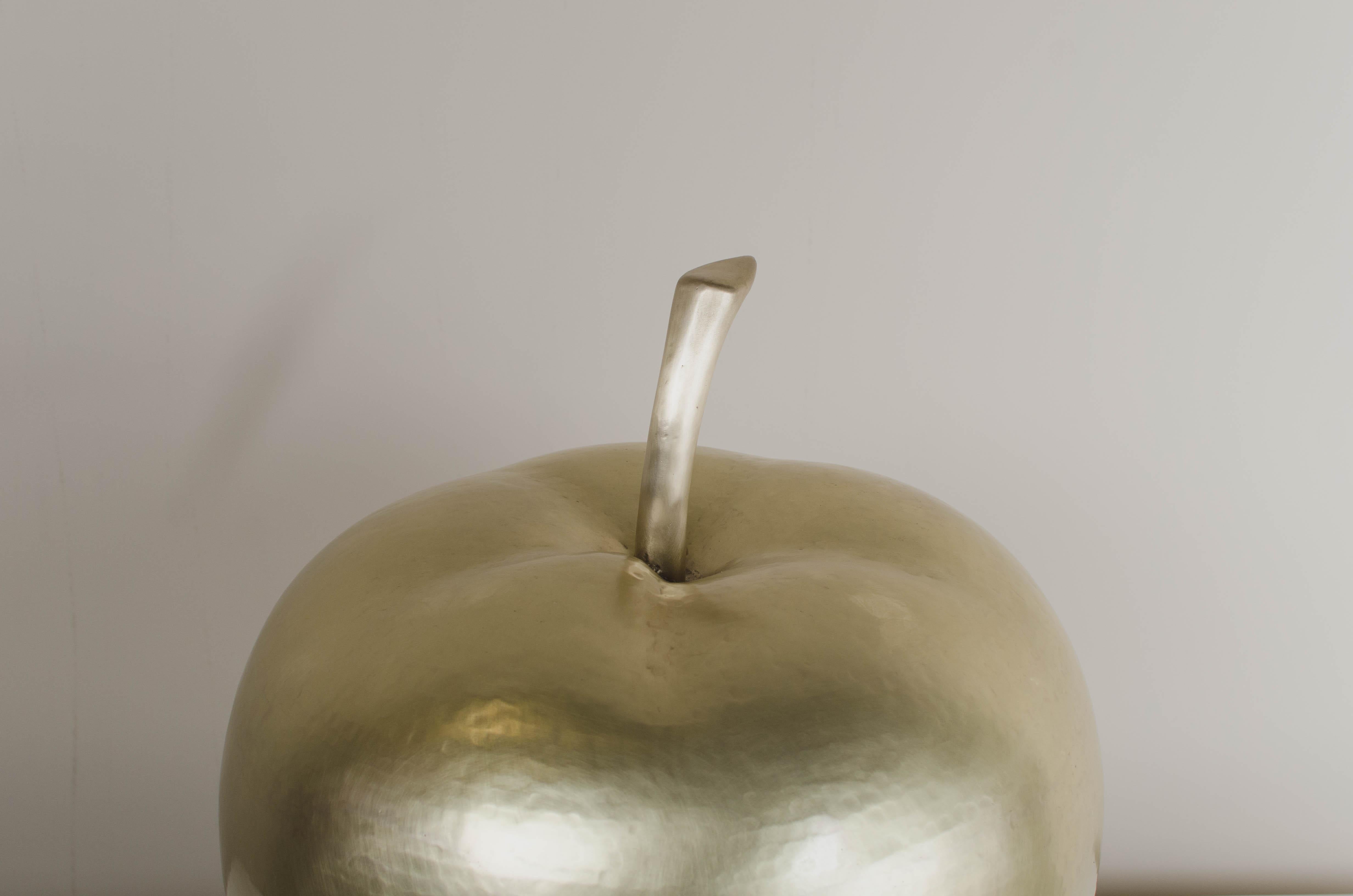 Apple
Brass
Hand Repousse
Limited Edition
Each piece is individually crafted and is unique.

Repousse´ is the traditional art of hand-hammering decorative relief onto sheet metal. The technique originated circa 800 BC between Asia and Europe