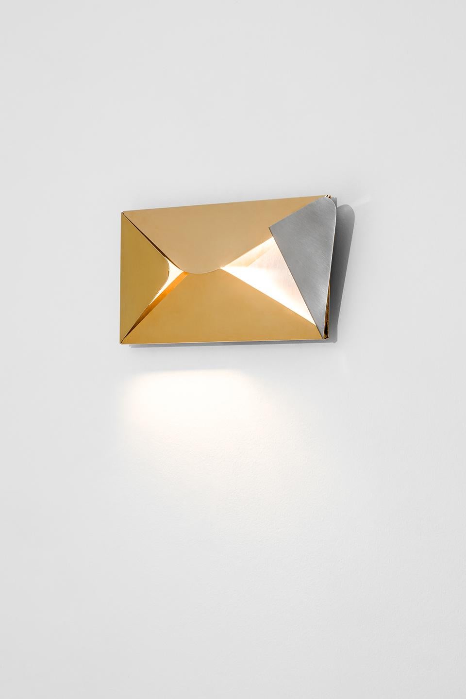 Applique in brushed steel and polished gold-plated brass.
Available in 2 styles (to be specified when ordering). Published Price is for 1 lamp.
Dimoremilano collection, by designer Dimorestudio.
Code: Applique121 
22% VAT WILL BE ADDED ON EUROPEAN