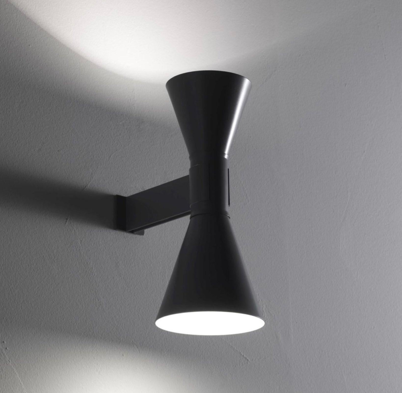 Applique de Marseille by Le Corbusier. Current production designed and manufactured in France by Nemo Lighting. Aluminum painted matte grey, matte white or black, with white internal diffusers. Provides uplight and downlight. Comes in matte white,