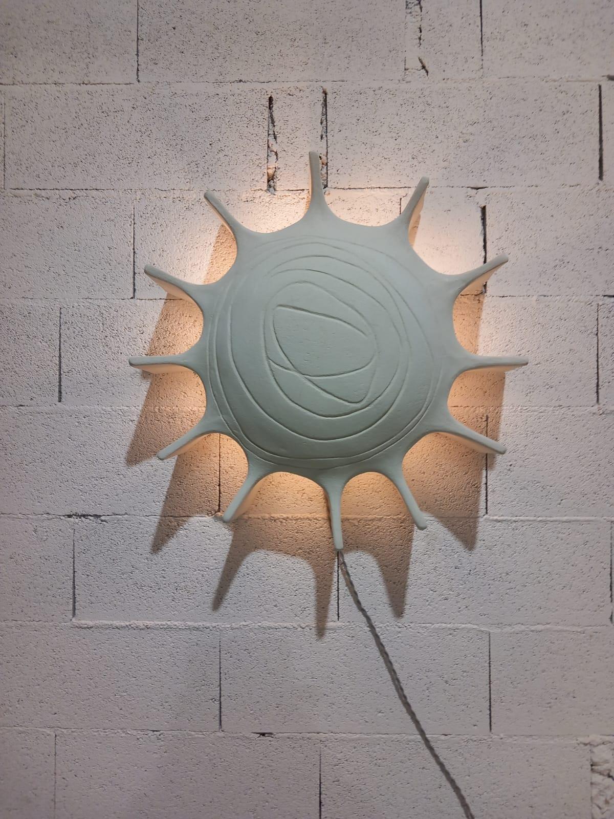 Ceramic wall lamp by Kseniya Kravtsova 2023 in white chamotte clay. 
Kseniya Kravtsova's pieces are signed and limited editions. 
Kseniya Kravtsova worked with Guy Bareff for several years and now creates her own production. 