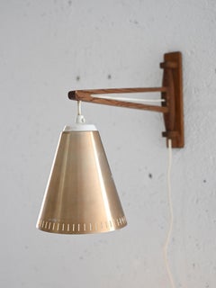 Wooden wall sconce with swivel arm