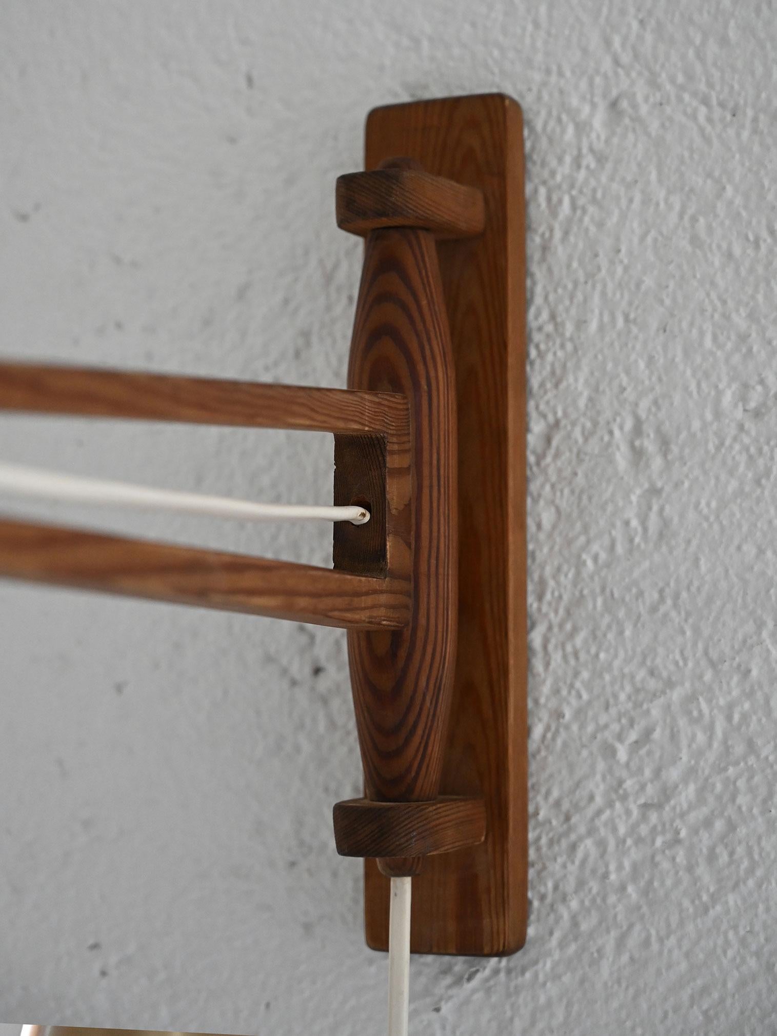 Aplique de madera con brazo pivotante en venta 1