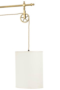 Applique in ottone Urban con braccio regolabile