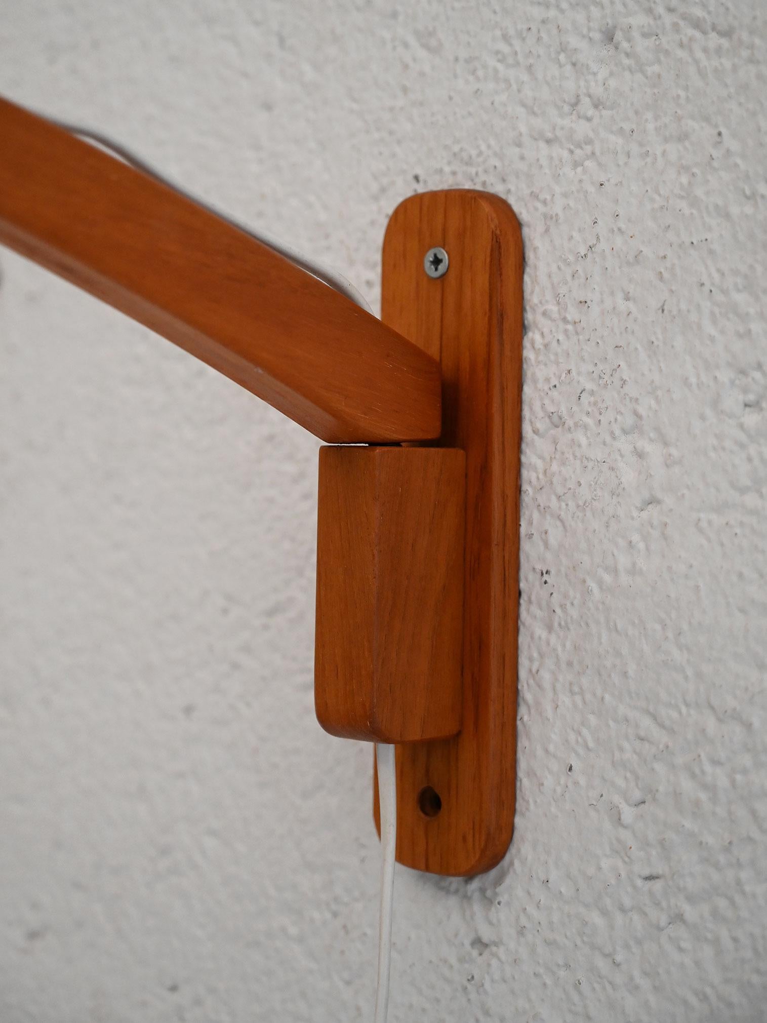 Scandinavian vintage teak and fabric wall sconce For Sale 1
