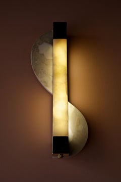 Sinuous wall sconce in onyx, gold calacatta marble, alps green and levanto red
