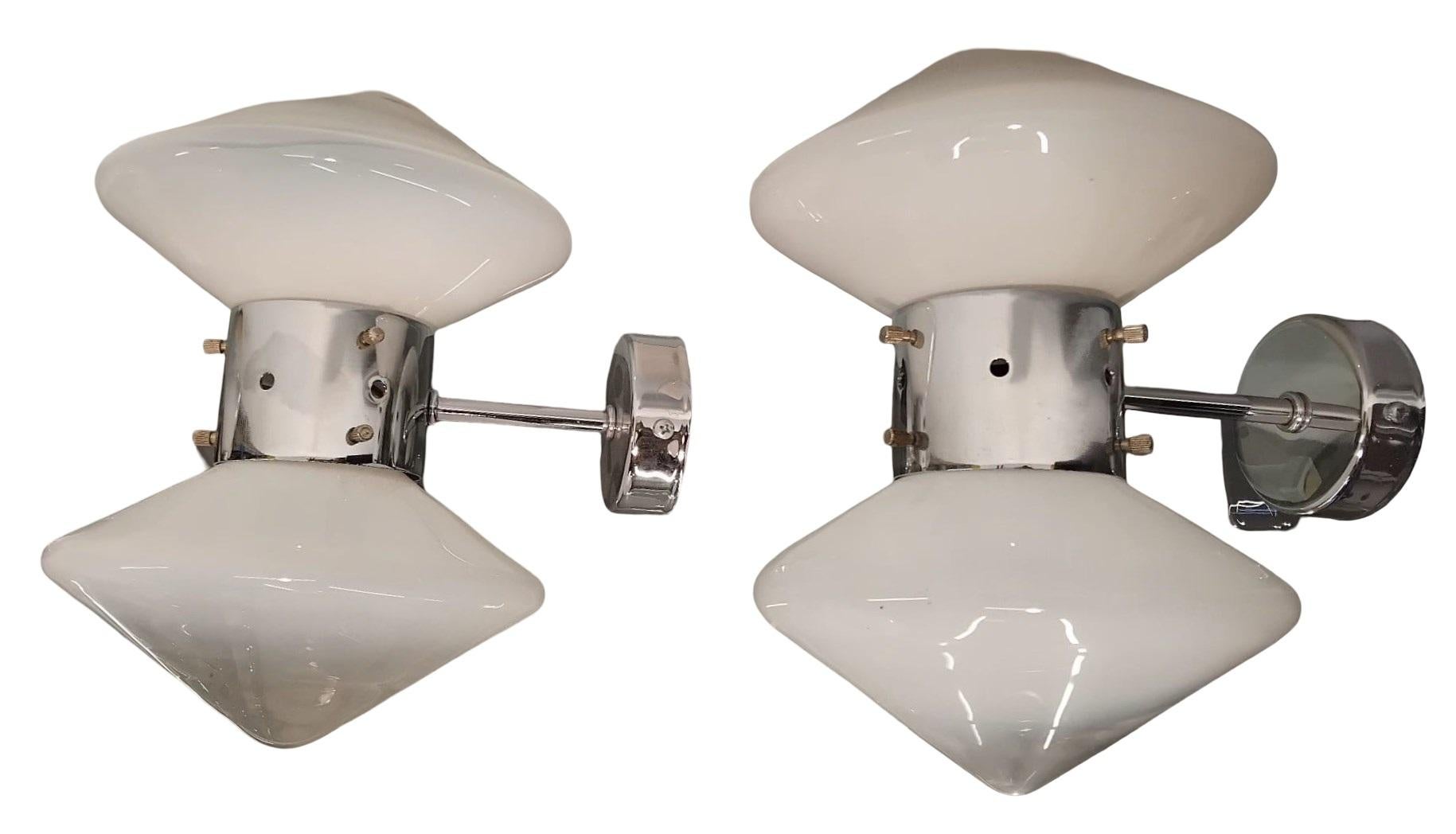 Murano glass metal wall sconce by Carlo Nason for Mazzega, Italy, 1970s, 
Retro-futuristic style wall sconce with polished chrome details and double-cone opal white smoked glass shades.
Smoked white opaline glass wall sconce.
3 pieces