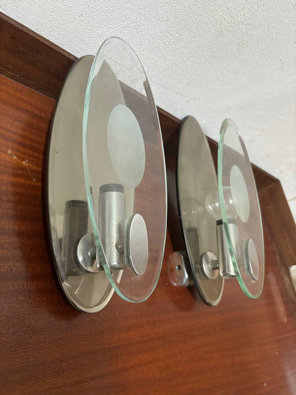 Italian Fontana Arte Italia style wall sconce with smoked mirror and 20th century nile green. For Sale