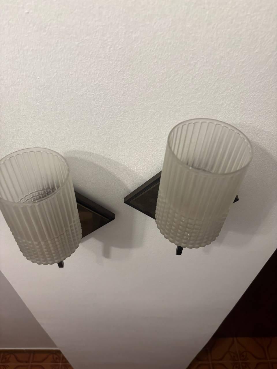Machine-Made Stilnovo wall sconce  brass  1970 cast iron glass. For Sale