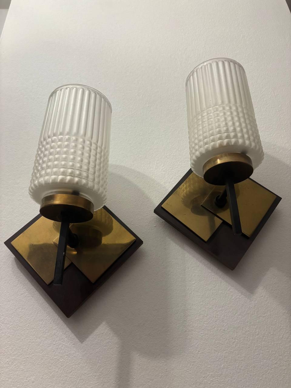 Late 20th Century Stilnovo wall sconce  brass  1970 cast iron glass. For Sale