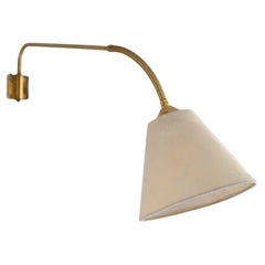 Vintage wall sconce with golden arm