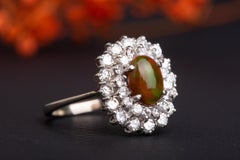 Vintage Ethiopian Fire Opal and 1.04 CT Diamond Halo Ring APPRAISAL REPORT