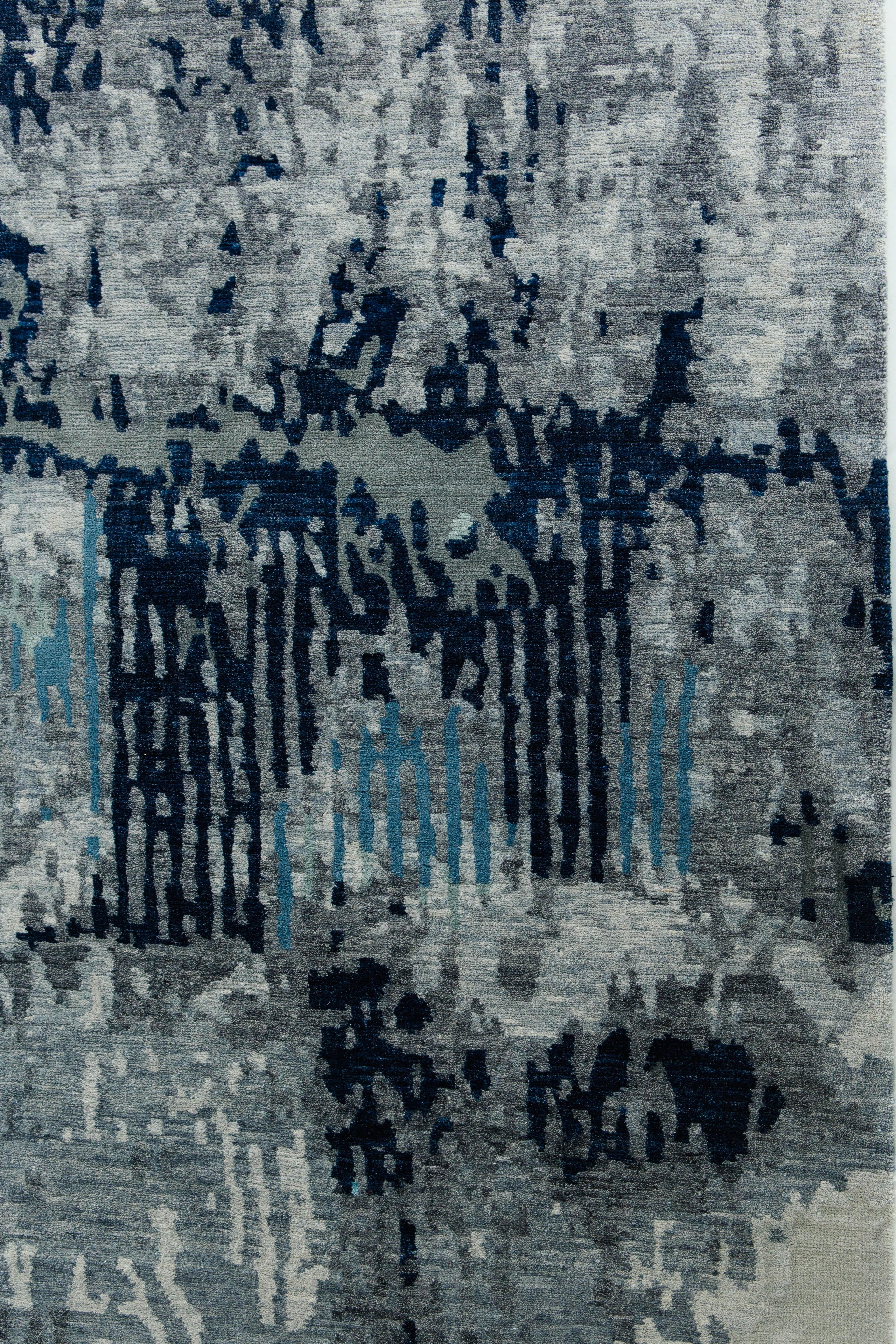 Inviting blues and grays work together to create a simple yet interesting design. This wool and silk piece invites a repeating effect of abstract lines which makes the rug a one of a kind, unique piece


Rug number 26375
Size 9' 0