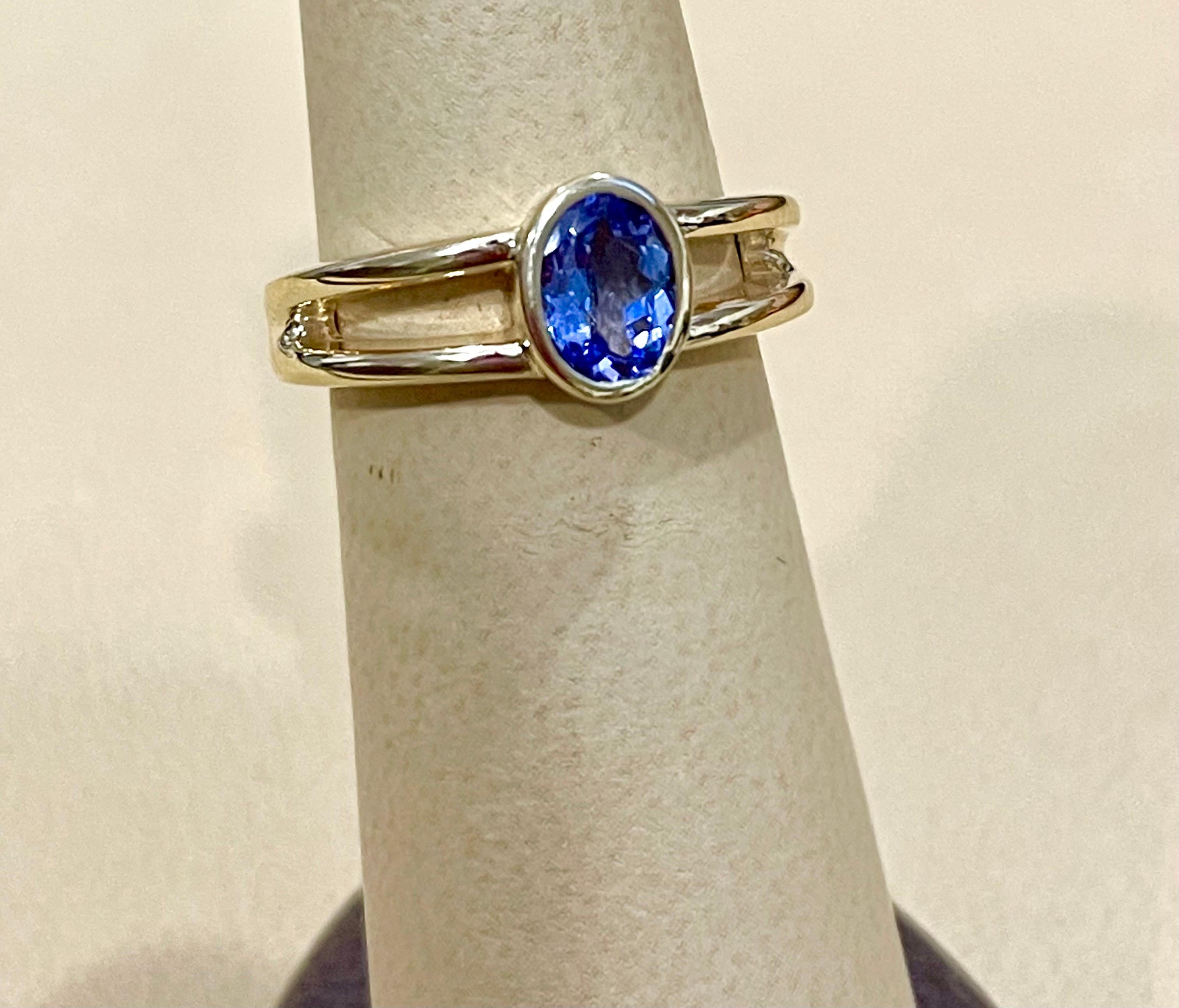 Oval Cut Approximately 0.75 Carat Oval Shape Tanzanite Ring 14 Karat Yellow Gold
