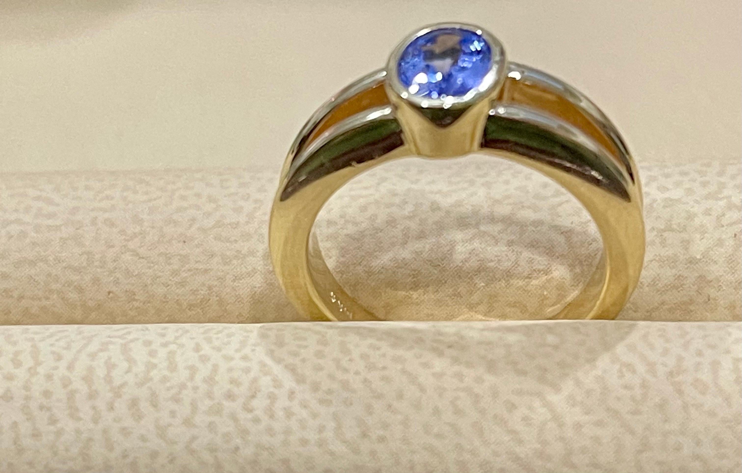 Approximately 0.75 Carat Oval Shape Tanzanite Ring 14 Karat Yellow Gold In Excellent Condition In New York, NY