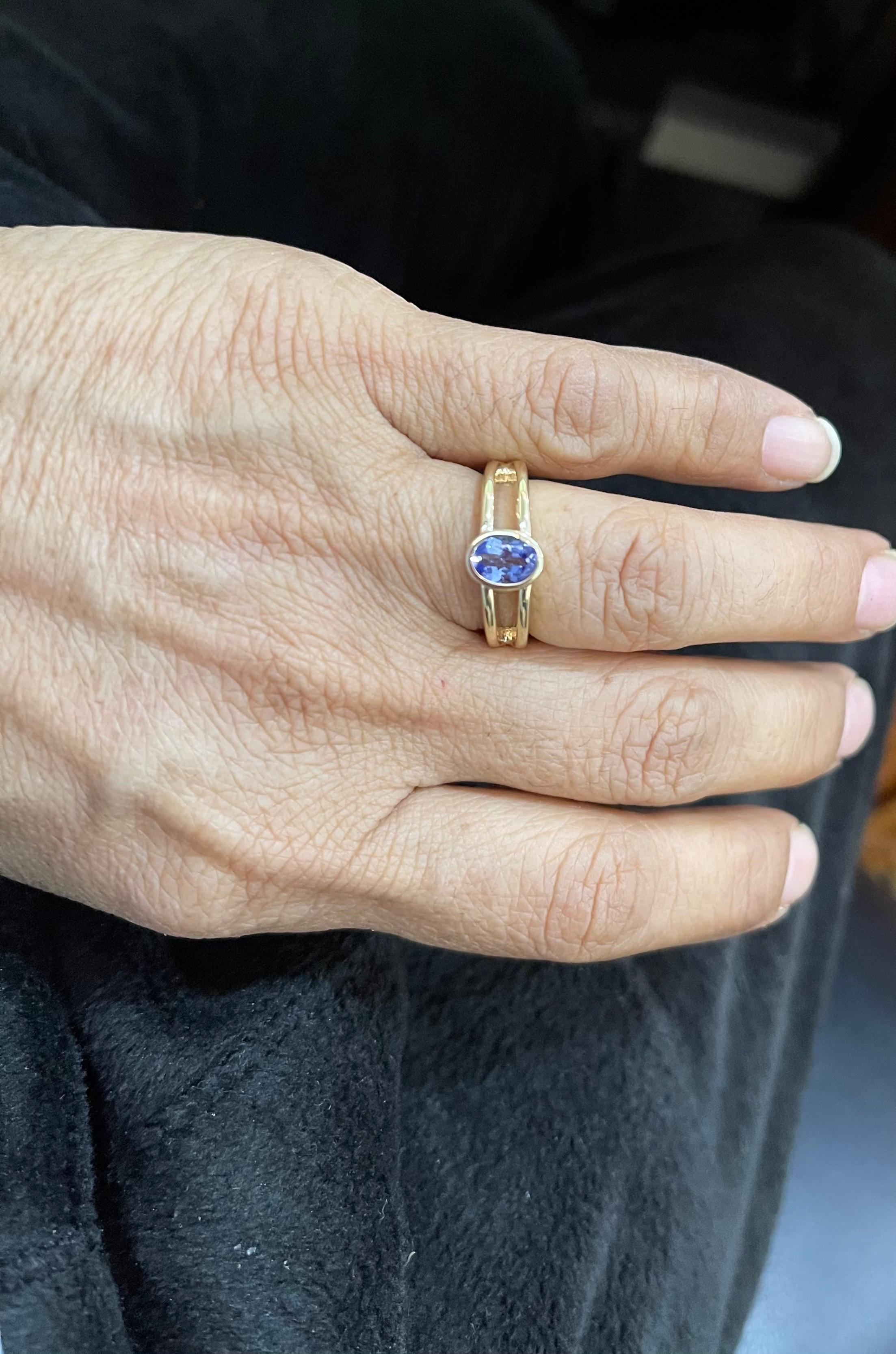 Approximately 0.75 Carat Oval Shape Tanzanite Ring 14 Karat Yellow Gold 6