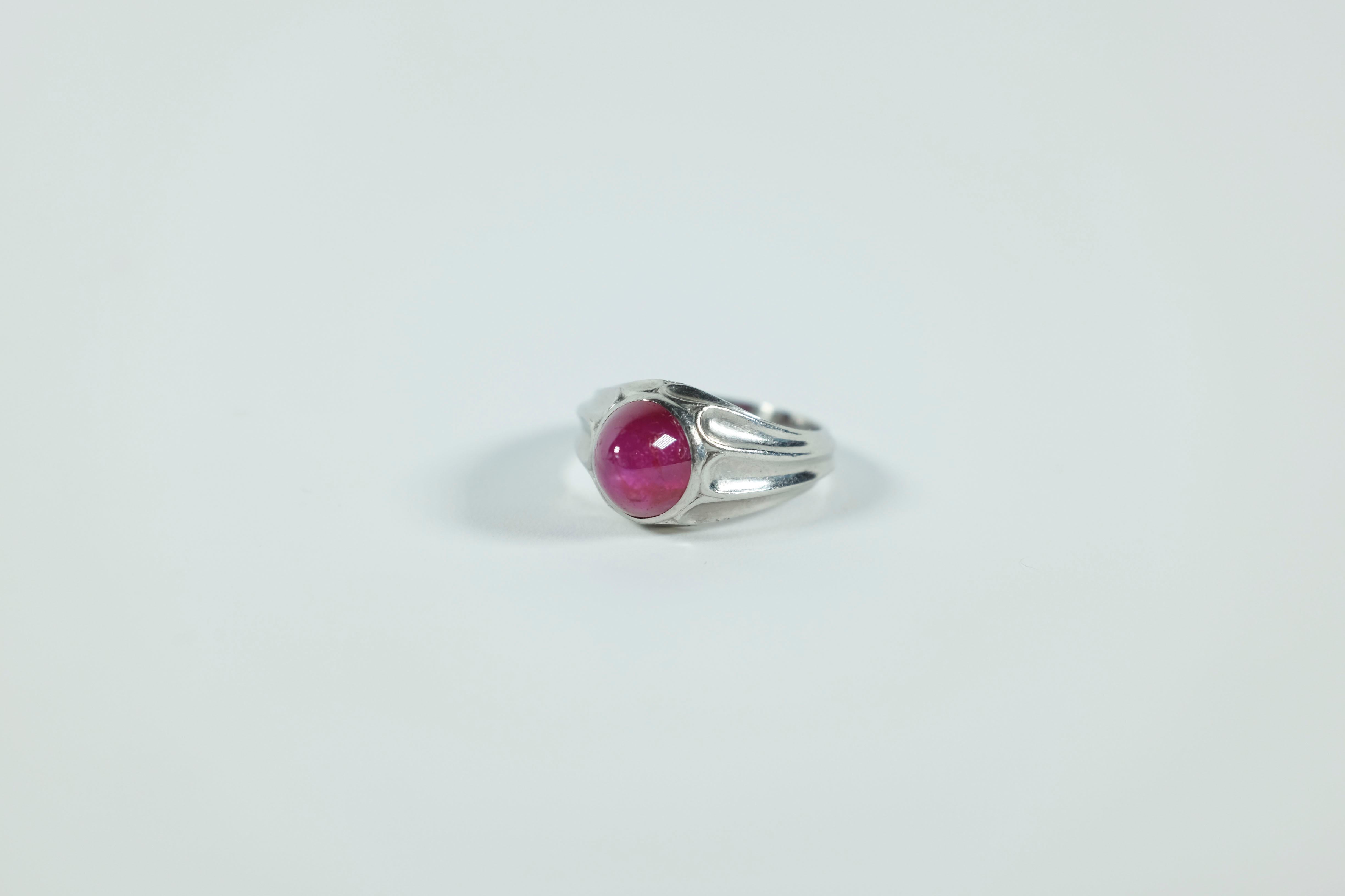 Estimated 2.00 carat Cabochon Star Ruby mounted in it's original Art Deco era Tiffany and Co ring.  Hand carved platinum, over 100 years old.  The star is diffused, but this ring...  wow.  