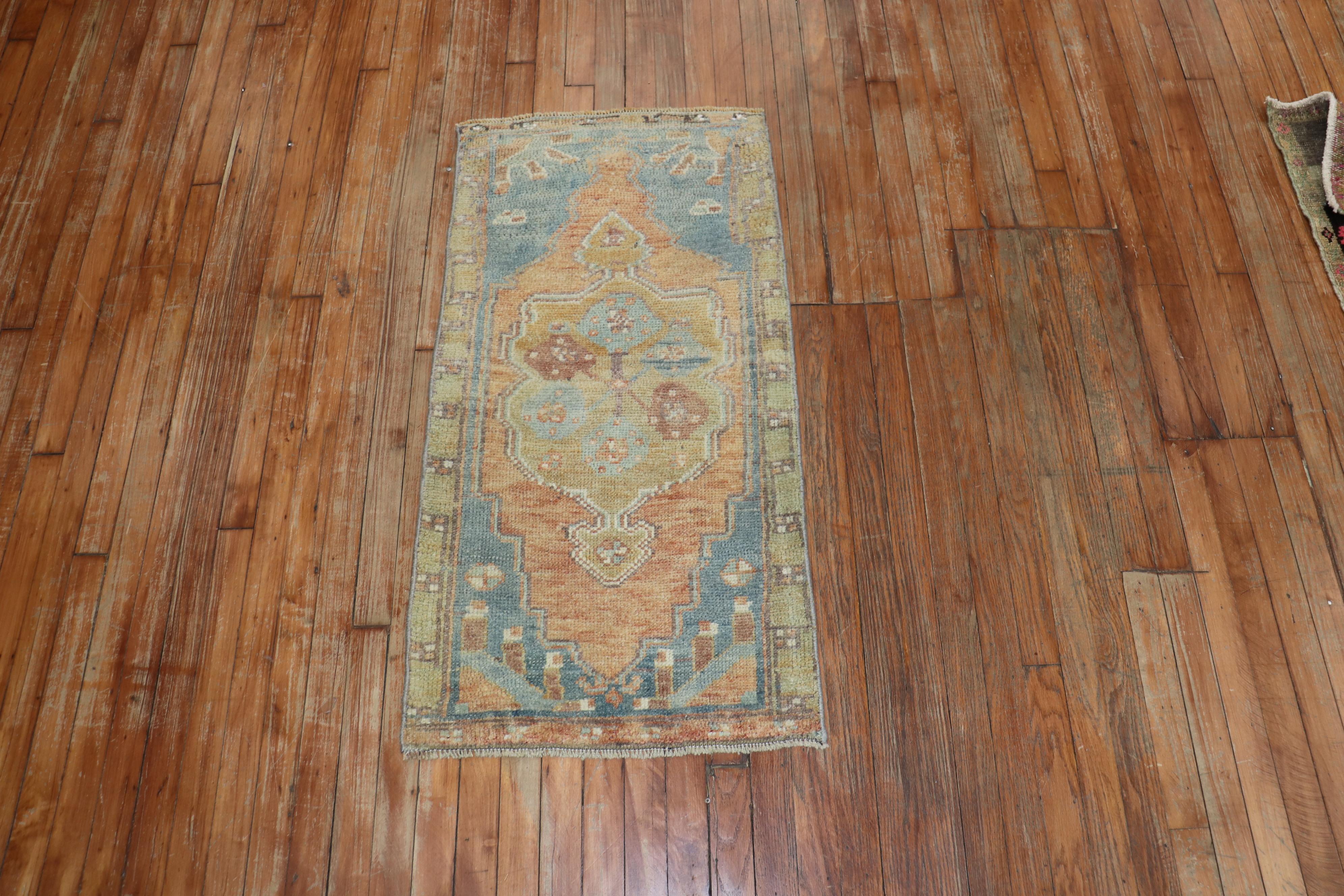 Apricot gray blue color mid-20th century Turkish Mat rug.
Measures: 2' x 3'10