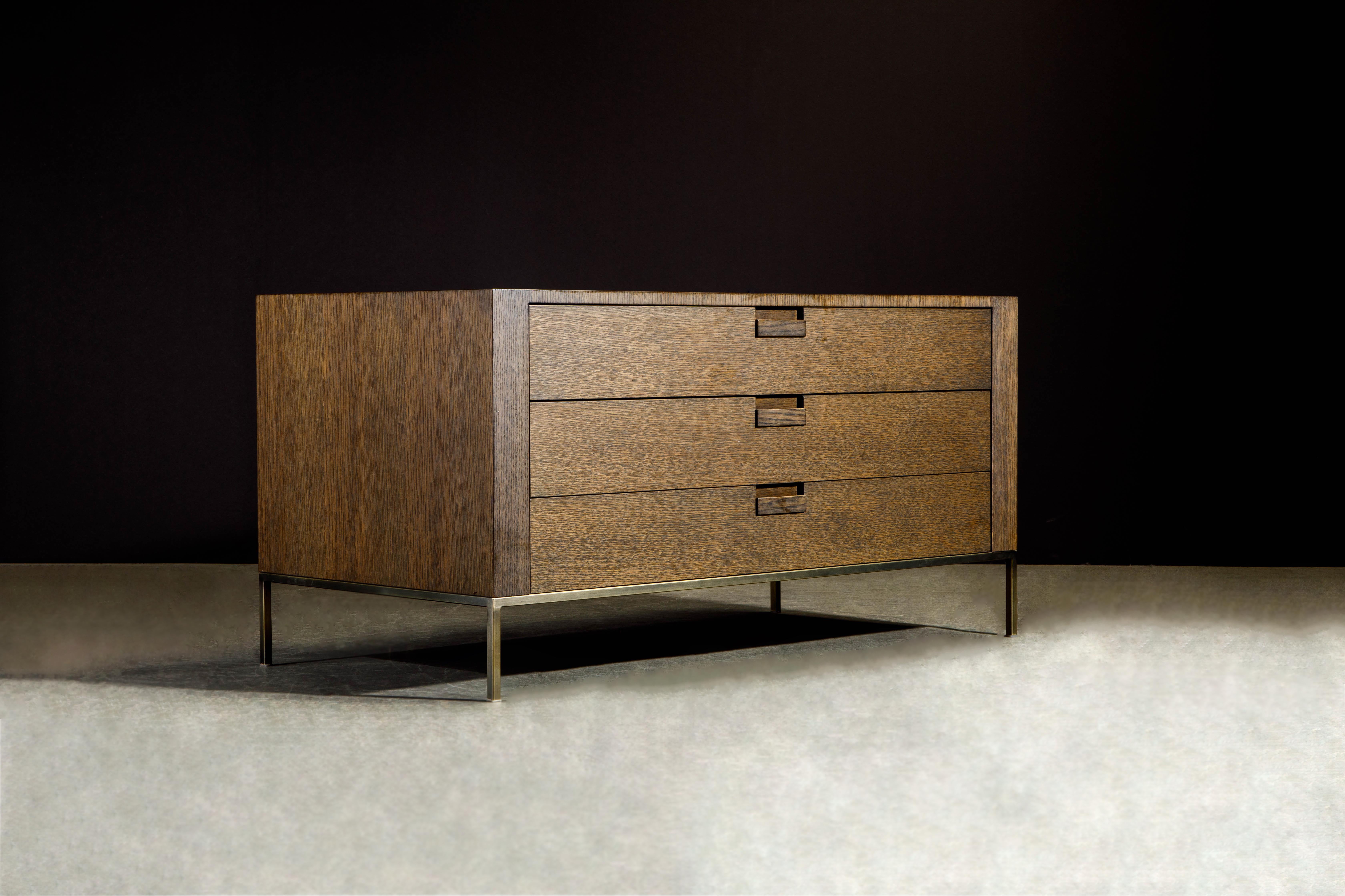 A beautiful and well made 'Apta' dresser which also functions great as a media console table by Antonio Citterio for B&B Italia. This chest of drawers features beautifully cerused wood with attractive grain and deep brown color, over a floating