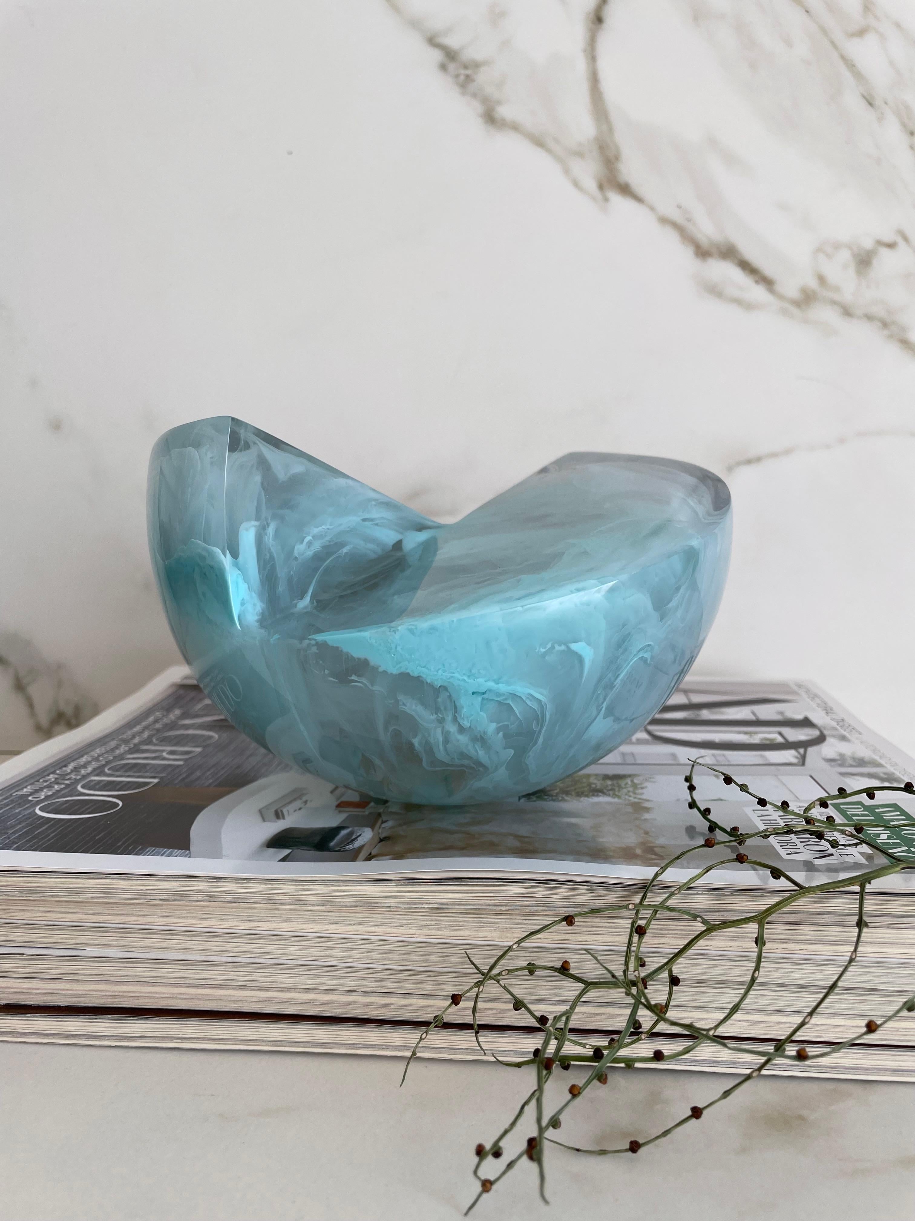 This Geometric sculpture is handmade in polished resin in a variety of colors. It is a modern and colorful piece that will liven up any space.

Our Semi Sphere is a very cool and fun piece! It can be transformed into a complete sphere when you place