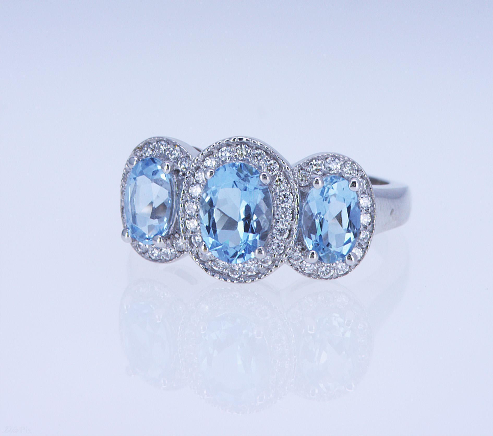 For Sale:  Aqua and Diamond 3-Stone Ring