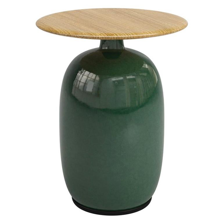 Side table aqua ceramic anthracite made with handcrafted
anthracite ceramic base and with teak top. Outdoor-indoor use.
Also available with base in green ceramic or in light grey ceramic base,
on request.