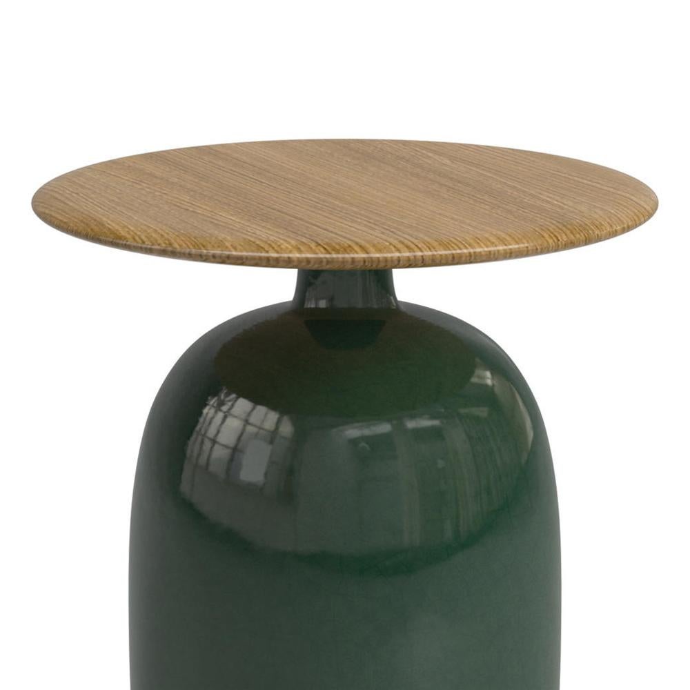 Side table aqua ceramic green made with handcrafted
green ceramic base and with teak top. Outdoor-indoor use.
Also available with base in light grey ceramic or in anthracite 
ceramic base, on request.