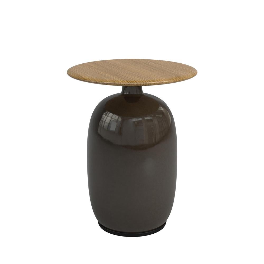 Side table aqua ceramic light grey made with handcrafted
light grey ceramic base and with teak top. Outdoor-indoor use.
Also available with base in green ceramic or in anthracite ceramic base,
on request.