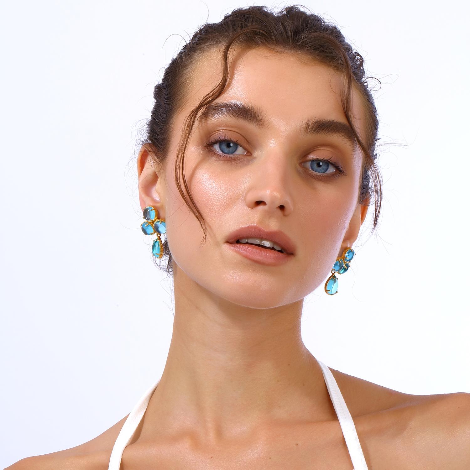 * Unique Design: The Aqua Earrings capture the essence of fluid elegance, featuring a refined, cascading design inspired by the movement of water. Adorned with carefully selected natural stones, they bring a touch of effortless sophistication to any