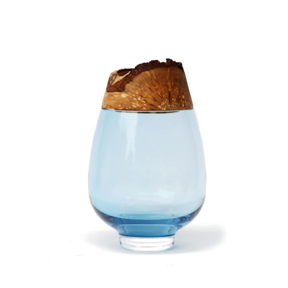 Aqua Frida stacking vessel, Pia Wüstenberg
Dimensions: D 13 x H 20
Materials: cut glass, wood
Available in other colors.

Handmade in Europe: hand blown glass (Czechia), handturned wood (Finland).
The materials then come to our warehouse in