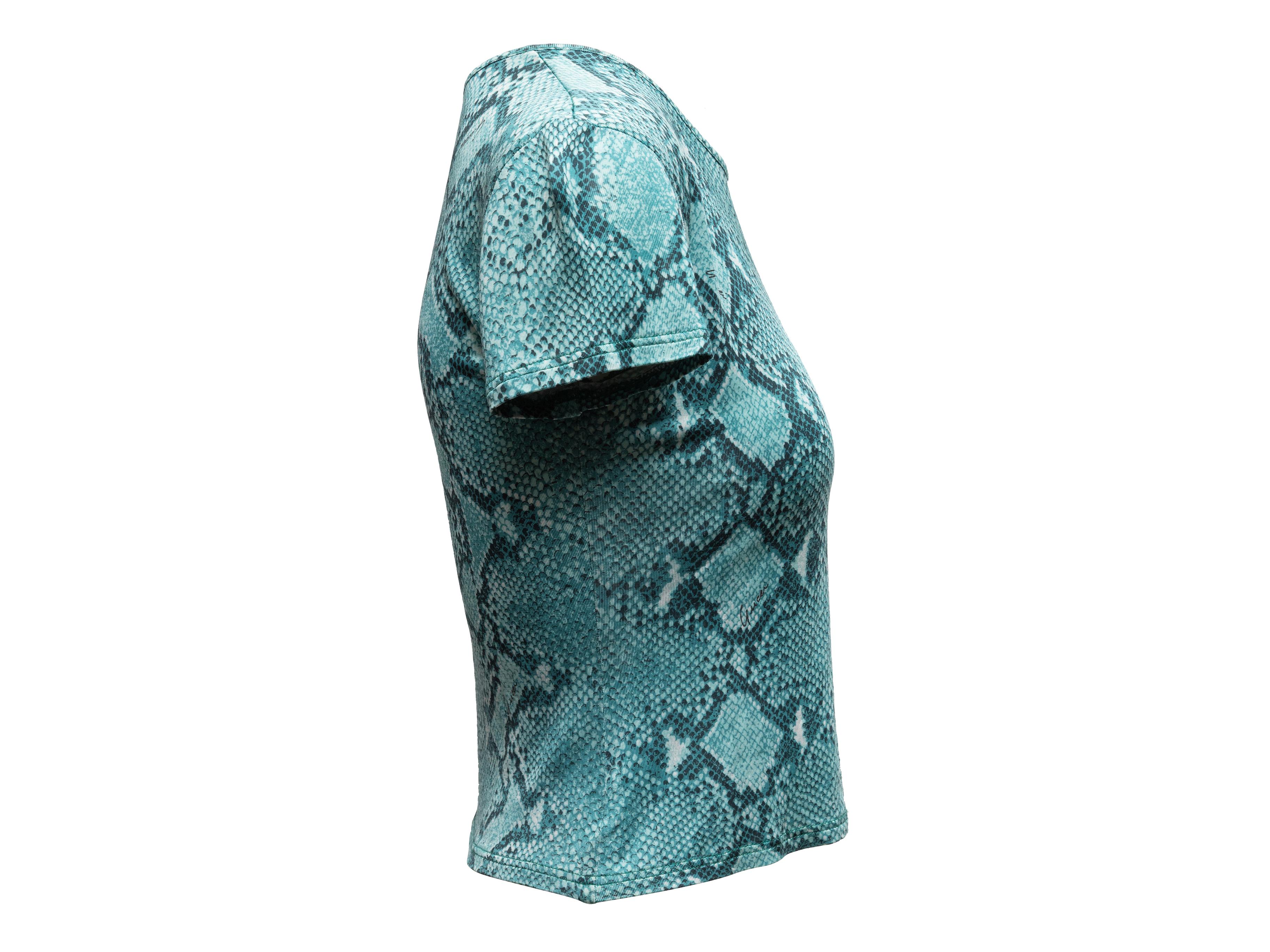 Aqua short sleeve T-shirt by Gucci. Snakeskin print throughout. Crew neck. 30