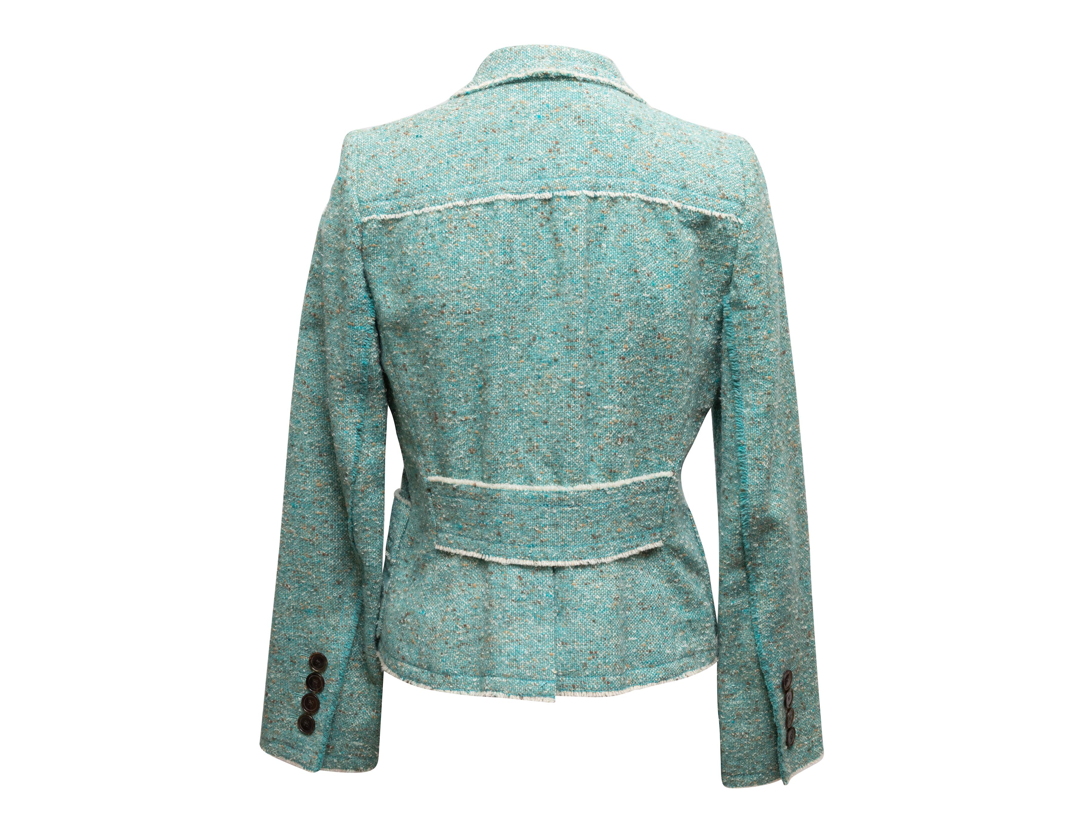 Aqua wool tweed blazer by Marc Jacobs. Peaked lapel. Dual hip pockets. Single front button closure. 35