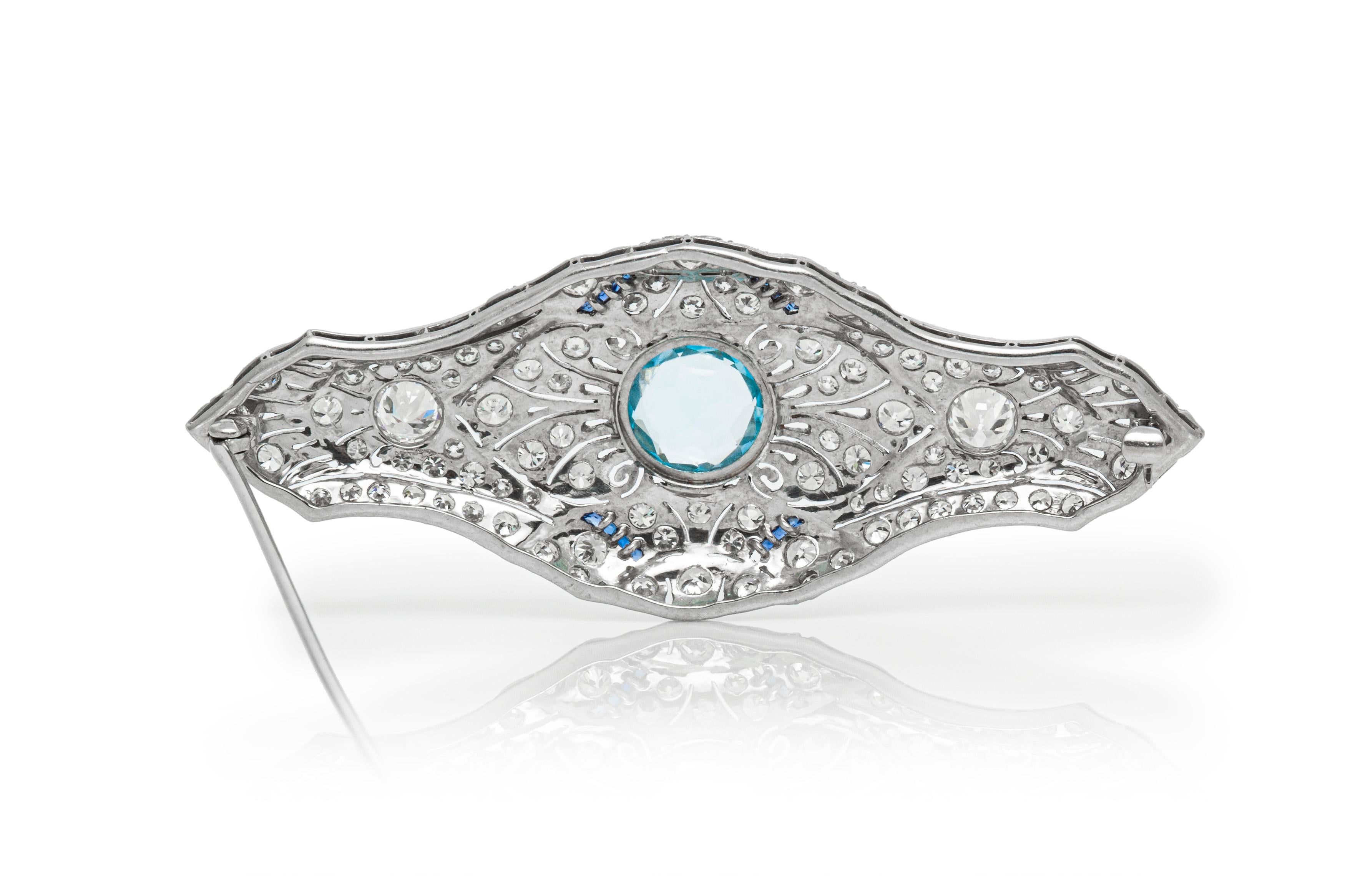 The brooch is finely carfted in platinum with diamonds weighing approximately total of 7.00 carat and aqua marine weighing approximately total of 6.00 carat and sapphire.