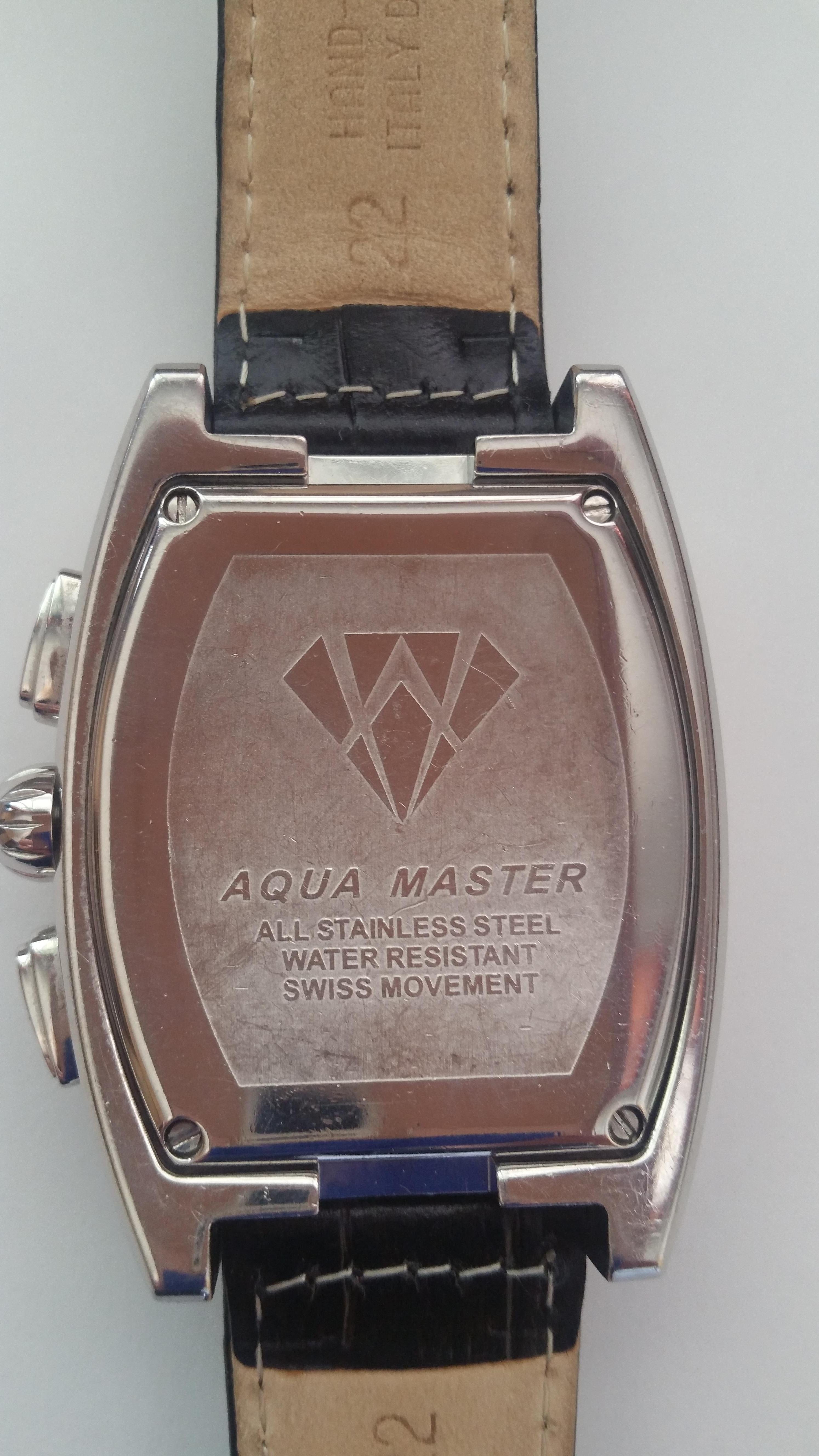 Aqua Master Genuine Diamond Watch Stainless Steel with black leather band. All stainless steel, water resistant and Swiss movement. The diamonds is rows of round brilliant diamonds.  The month of pearl blue sub-dials. The face has a nice silver