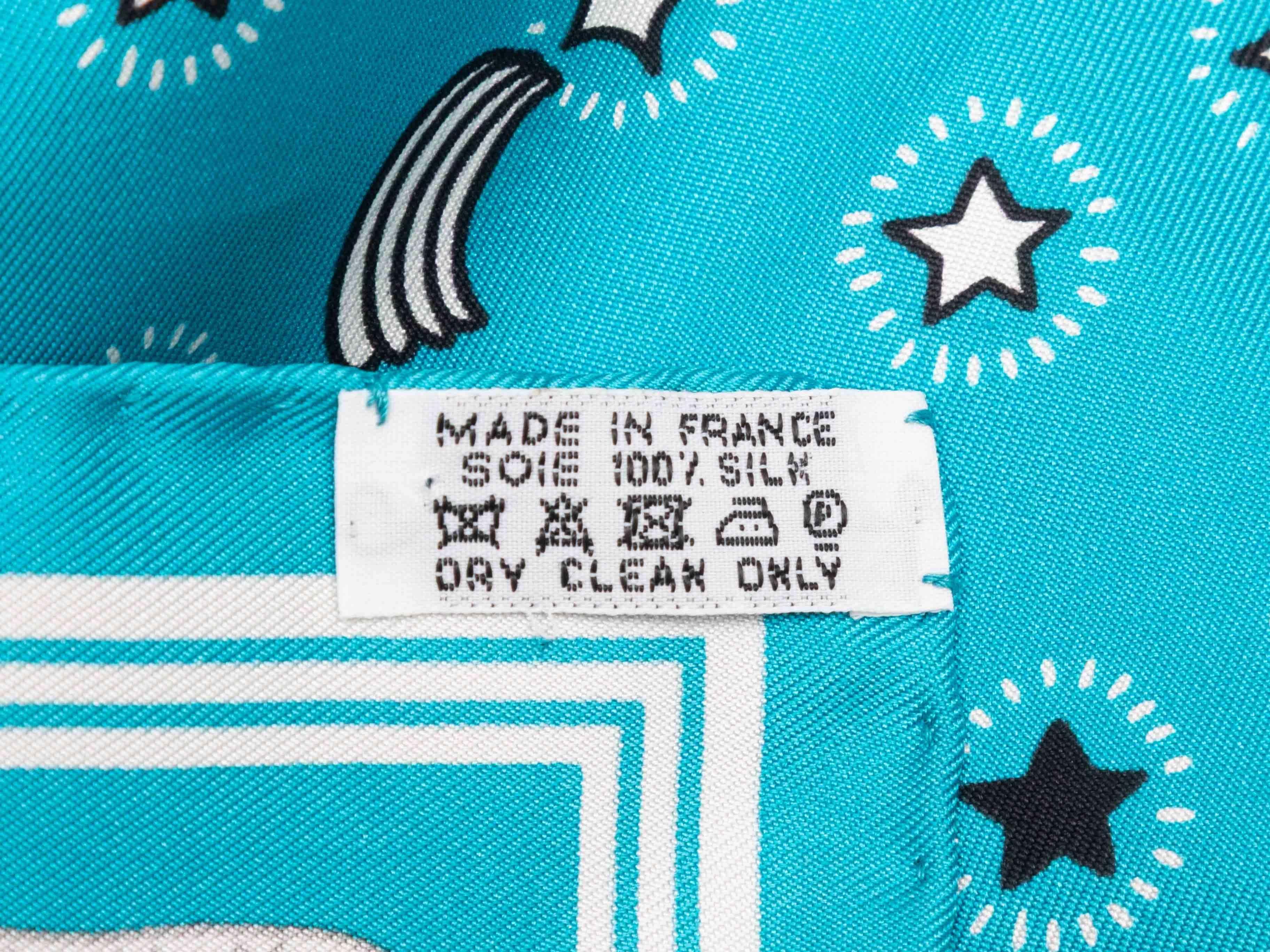 Aqua, white, and black 'Les Canyons Etoiles' motif printed silk scarf by Hermes. 22