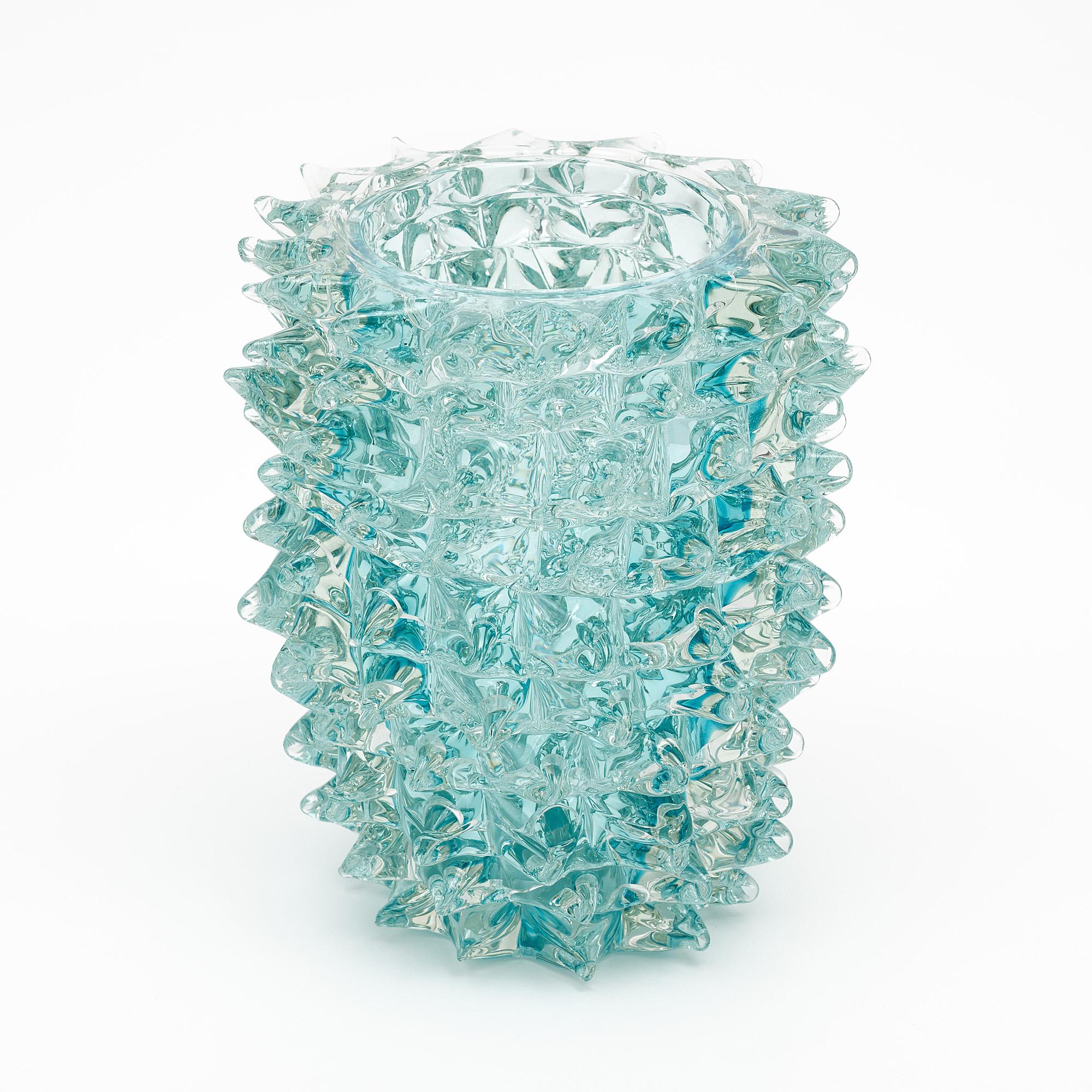 Italian Murano glass vase, in Aqua color, crafted in the “rostrate” technique, in the manner of iconic Murano glass powerhouse “ Barovier “, mimicking birds beaks. We love the striking Aqua color and texture of the “rostrate” technique.