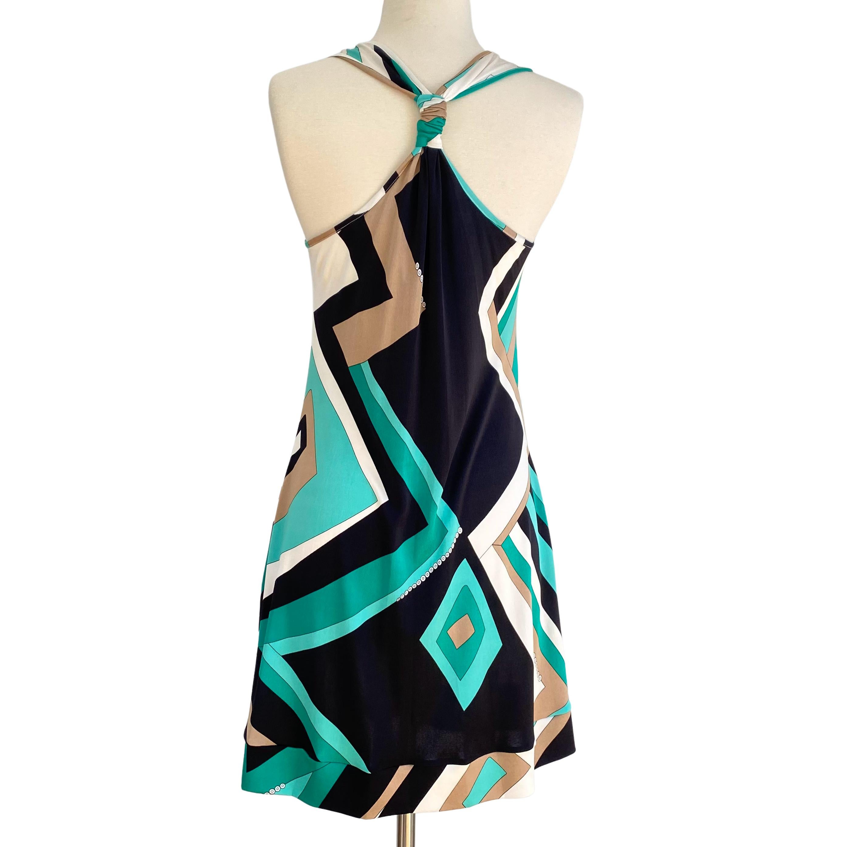 Pockets!! Cool comfy aqua sand color silk jersey mini halter dress with pockets.
Relaxed fit.
Shirred front to enhance bust area. 
Lots of volume with every movement.
Approximately 34