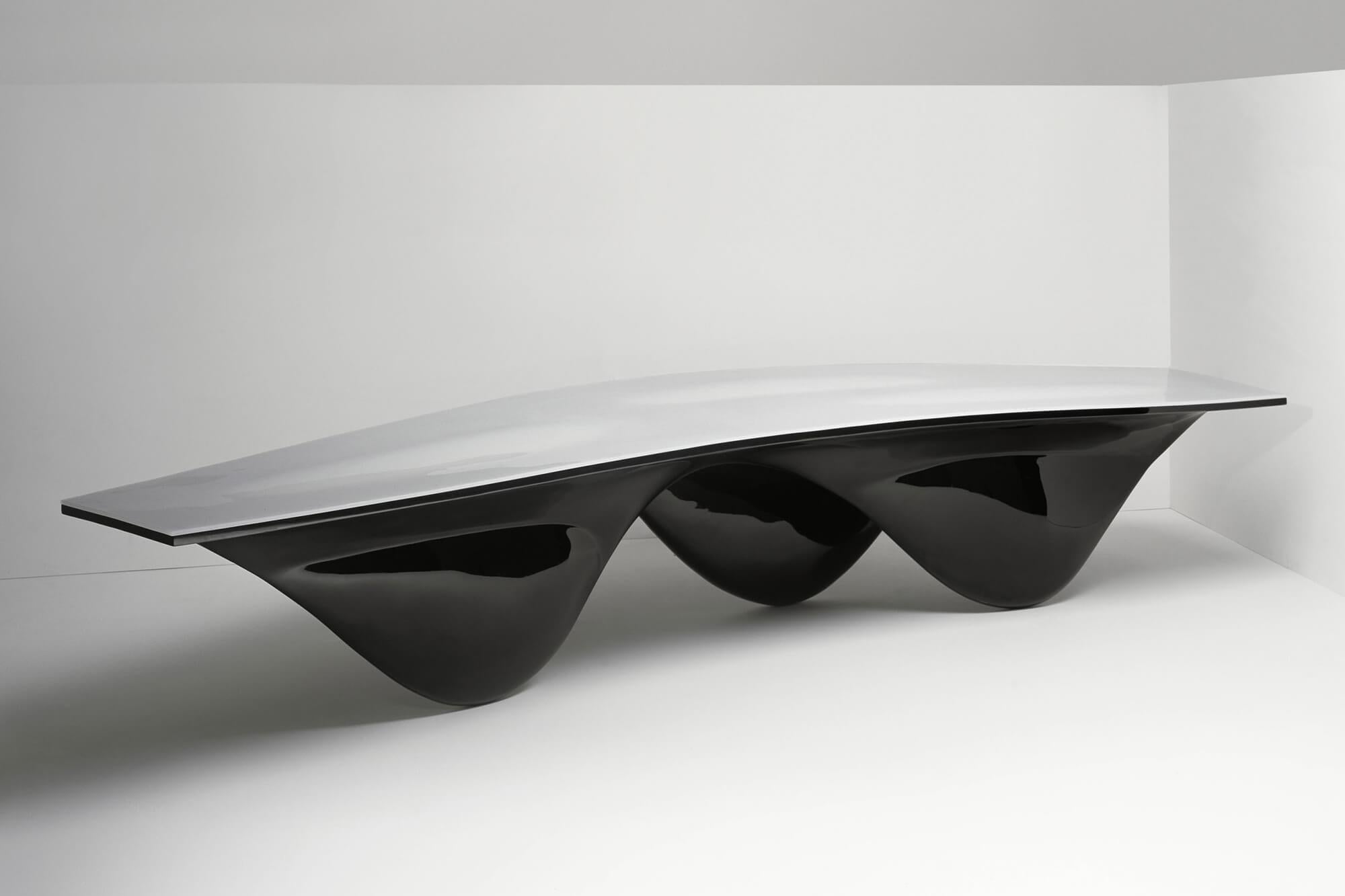Zaha Hadid’s voluptuous aqua table is? An uninterrupted whole – a curious and curvaceous form that invites viewers to engage with it. Standing as an impressive centerpiece it delivers a stylish focal point in any space. The three n-like legs of? The