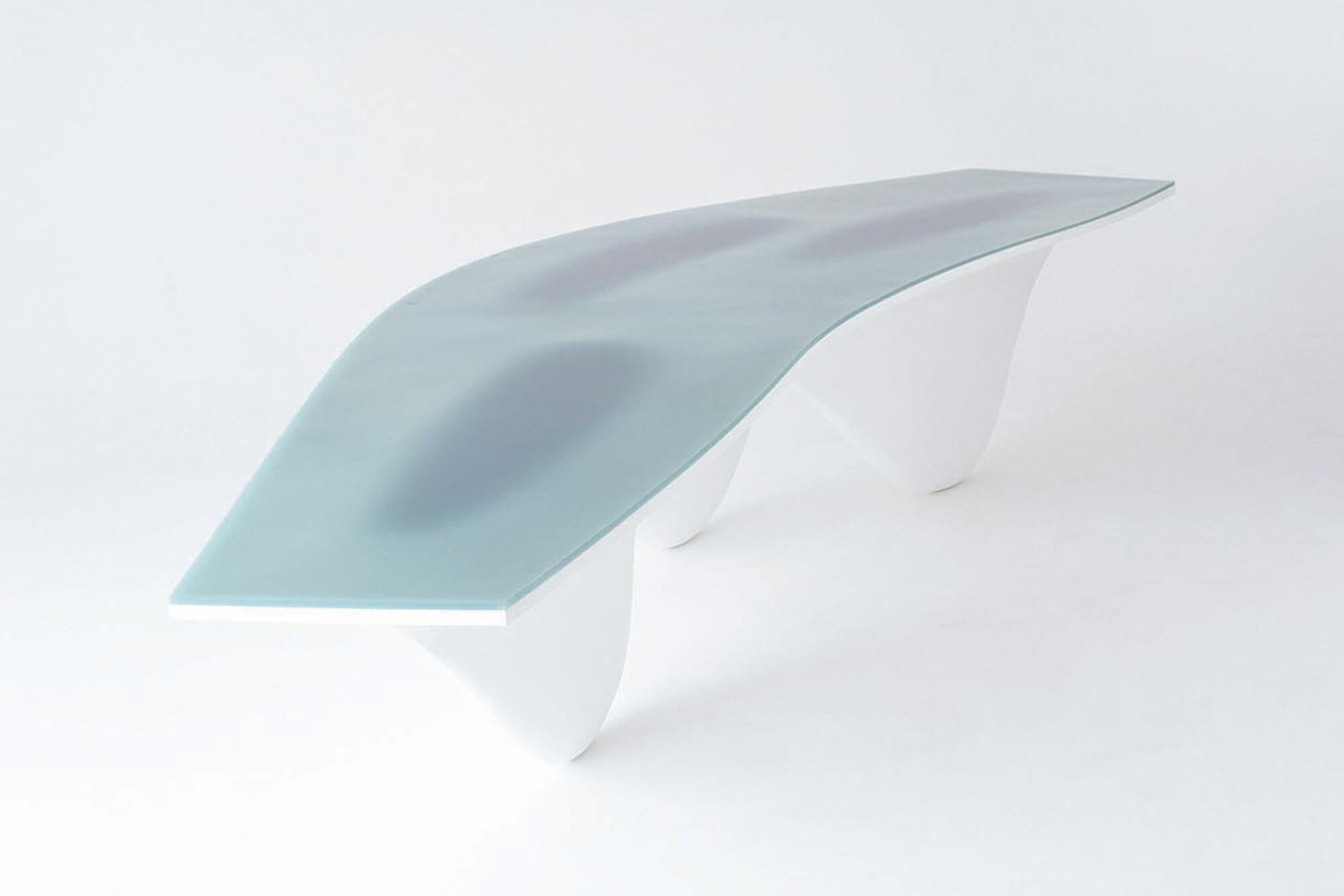 Zaha Hadid’s voluptuous Aqua table is an uninterrupted whole – a curious and curvaceous form that invites viewers to engage with it. Standing as an impressive centerpiece it delivers a stylish focal point in any space. The three n-like legs of the