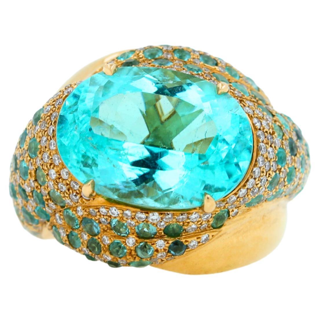 9 Carats Genuine Paraiba Tourmaline
Oval-Shape Brilliant Cut Form
16mm length of gemstone
12mm width of gemstone
Diamonds 0.65 ctw G VS
Pave Paraiba Tourmaline: 1.00 ctw
18K Yellow Gold
20.58 grams
Ring Size 7 
4.5 mm back shank width
21.0 mm front