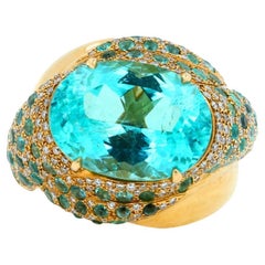 Bague en or jaune 18 carats avec tourmaline Paraiba de forme ovale bleu sarcelle pavé de diamants