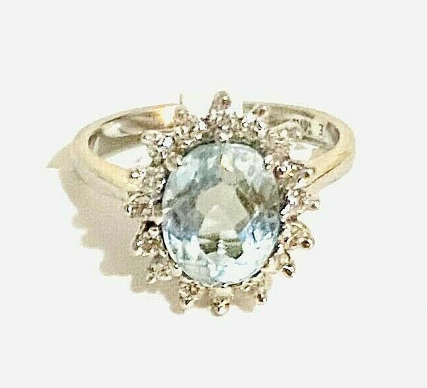 14k white gold aquamarine ring. The dimensions are approximately 10.5 mm x 7 mm. Approximately 2 carats.
Marked 14k. Approximate size 6.5