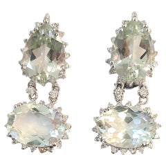 Goldohrringe mit Aquamarin und Diamant im Brillantschliff