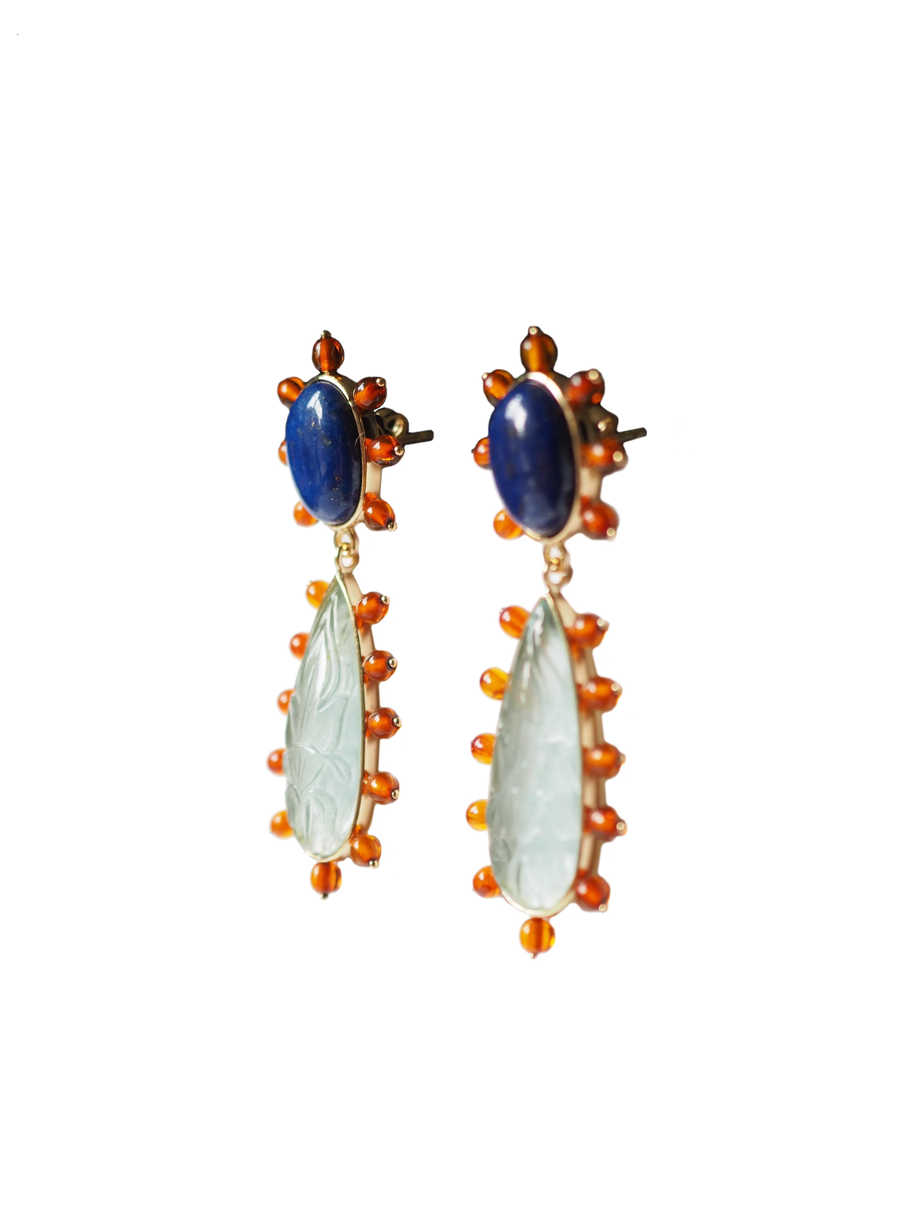 Carved Aquamarine drop 18 kt Gold gr 8,90 amber cabochon Lapis earrings. Total length 4,5cm
All Giulia Colussi jewelry is new and has never been previously owned or worn. Each item will arrive at your door beautifully gift wrapped in our boxes, put