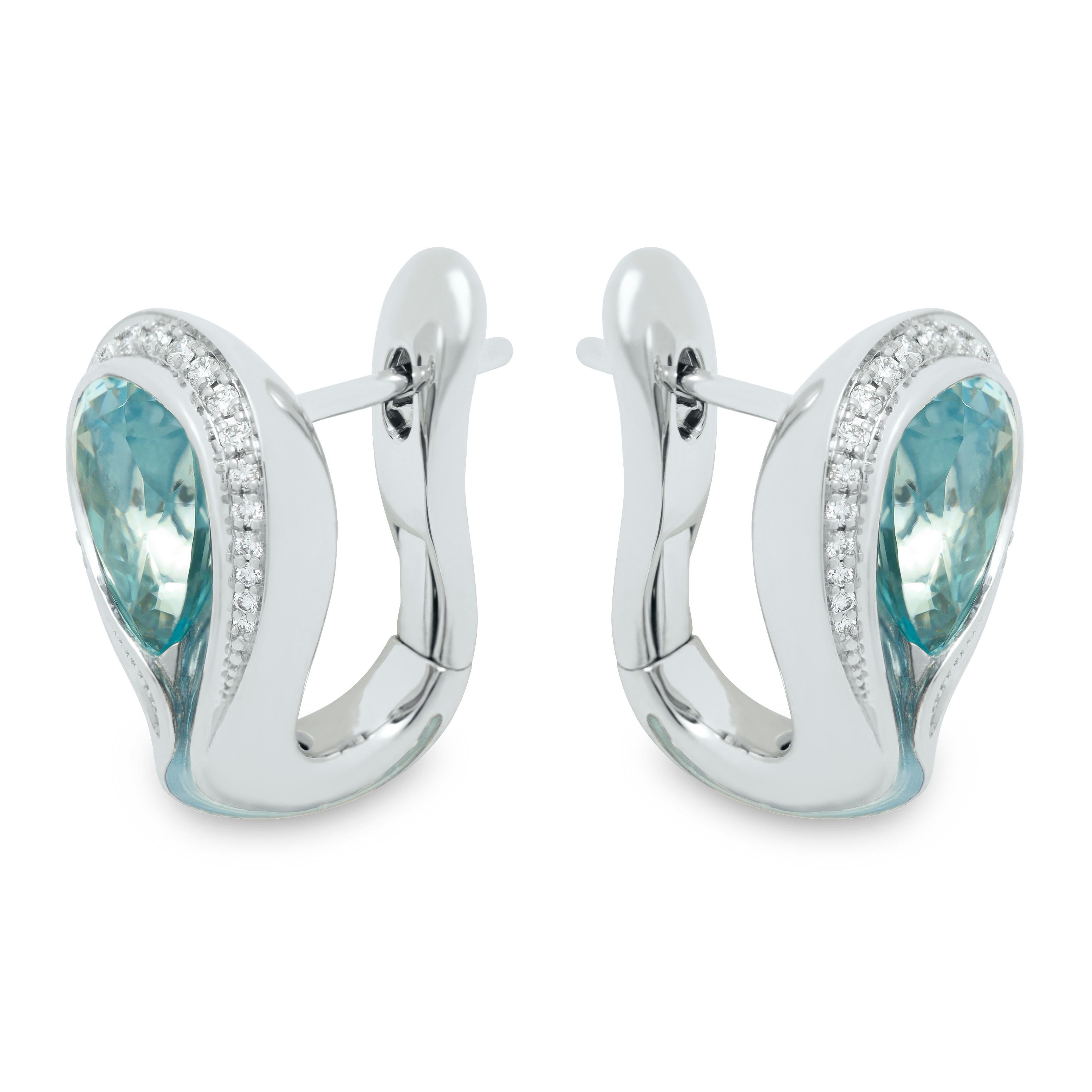 Aquamarine 2.54 Carat Diamonds Enamel 18 Karat White Gold Melted Colors Earrings
Enamel here seems to be spreading along the ring from the center down the shank, which reminds us of the name of the collection 