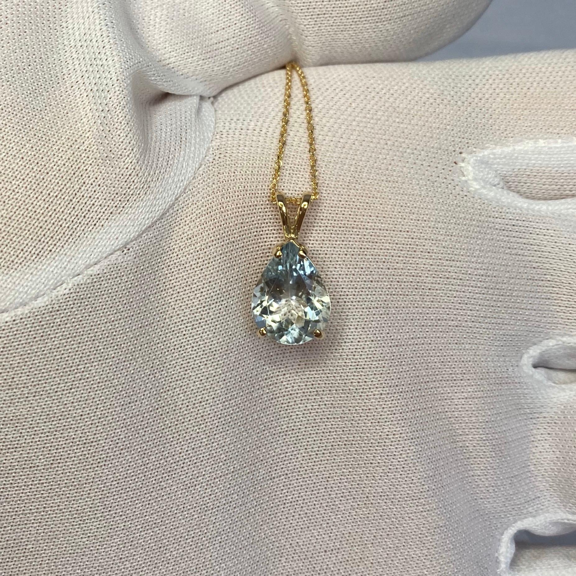 3.00 carat light blue Aquamarine set in a fine 14k yellow gold solitaire pendant.
Excellent clarity, very clean stone.

Also has an excellent pear cut showing lots of brightness and light return. Very sparkly.

Stone measures 11.7x9mm

The pendant