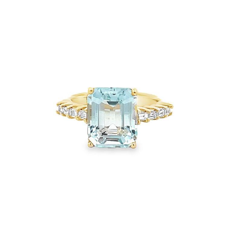 Prepare to be amazed by the stunning beauty of this fashion ring! This ring features a gorgeous emerald-shaped aquamarine gemstone in its finest color, weighing an impressive 4.20 carats. Alongside the aquamarine, you'll find exquisite baguette