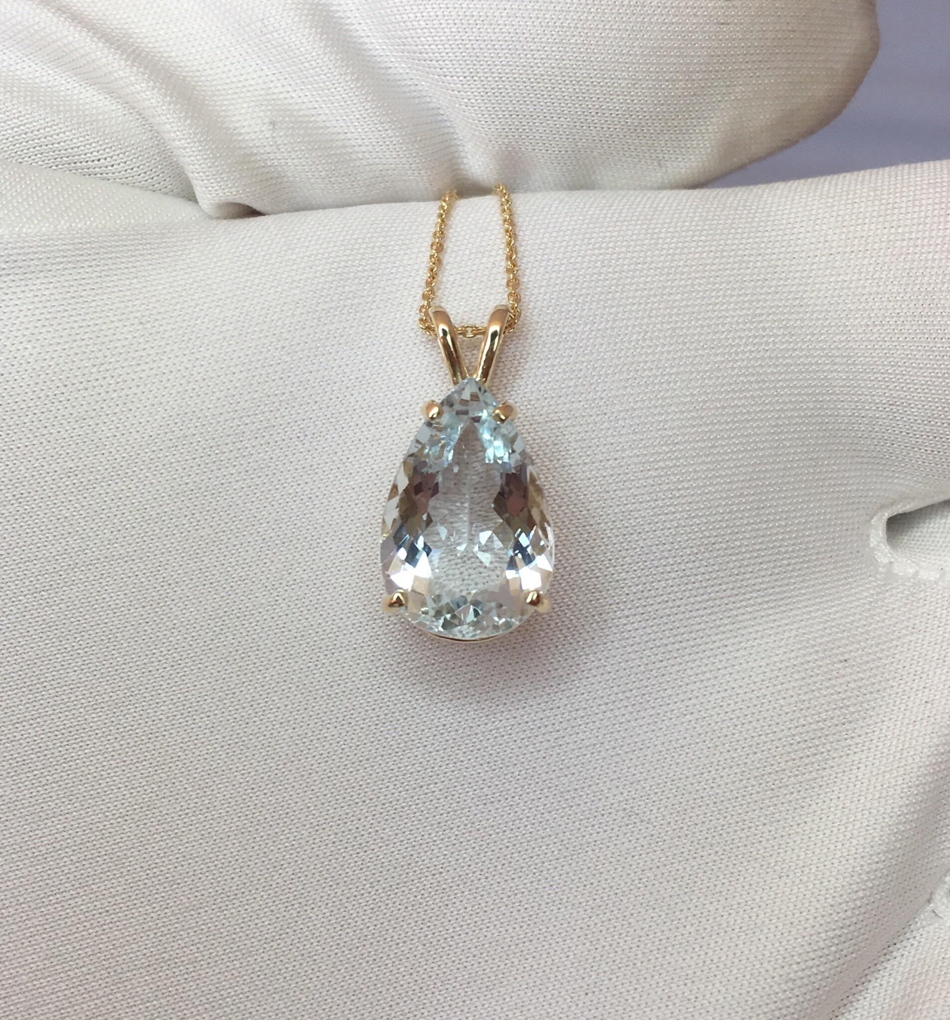 4.34 carat light blue Aquamarine set in a fine 14k yellow gold solitaire pendant.
Excellent clarity, very clean stone.

Also has an excellent pear cut showing lots of brightness and light return. Very sparkly.

Stone measures 14.6x9.7mm

The pendant
