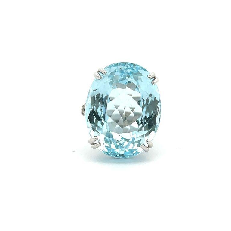 Our cocktail ring will undoubtedly captivate your heart with its stunning aquamarine gemstone that exudes beautiful color in every movement. The centerpiece of this magnificent ring features a remarkable 47-carat aquamarine that is elegantly